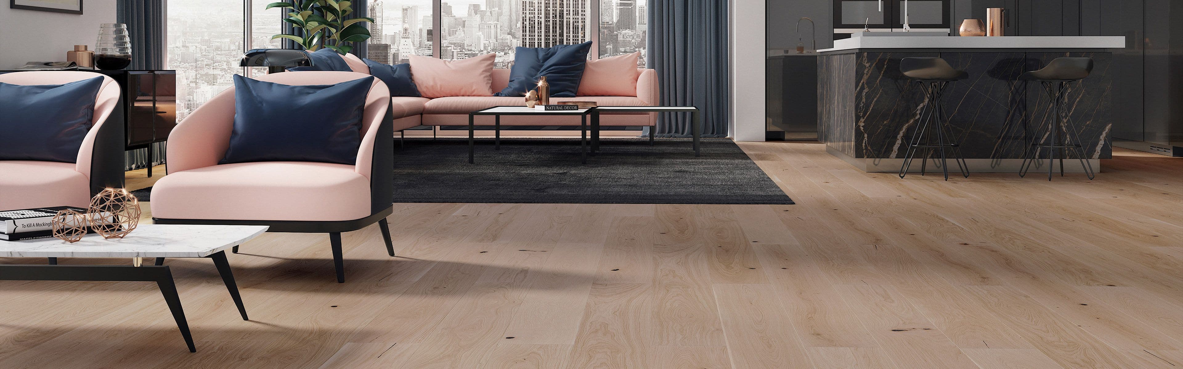 Åpen stue- og kjøkkenløsning med kjøkkenøy, rosa sittemøbler og Parkett Saga Natural gulv.