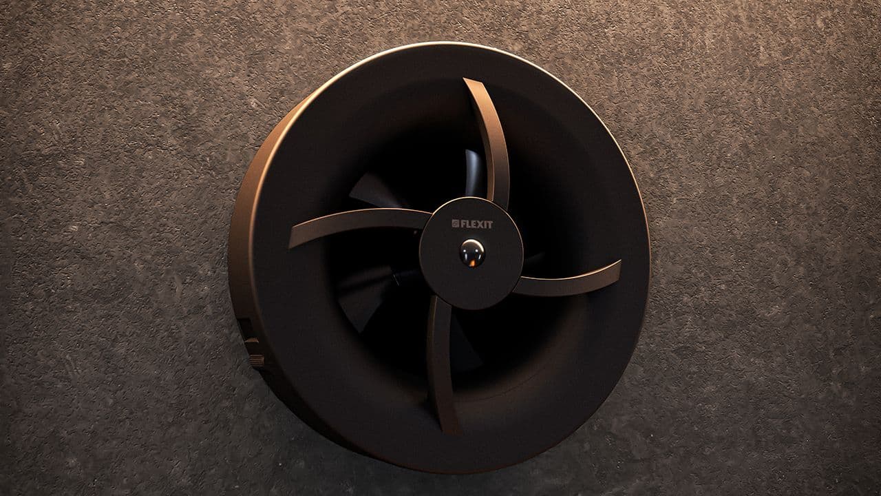 Nærbilde av svart baderomsvifte på svart vegg.